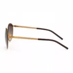 جزئیات دقیق دسته‌های فلزی عینک آفتابی ic berlin با ترکیب رنگ طلایی و قهوه‌ای